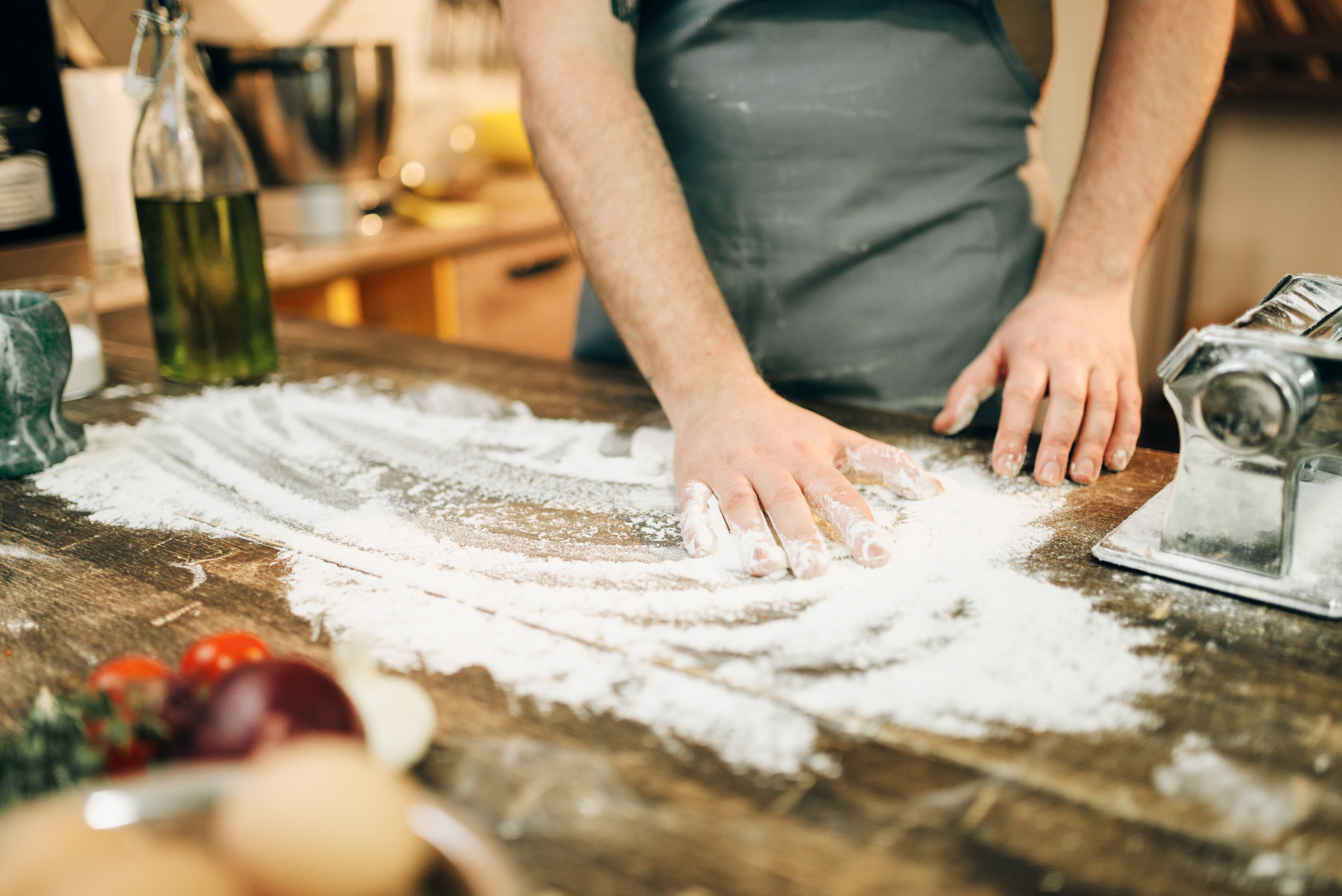 Student finishing a hand-rolled pasta